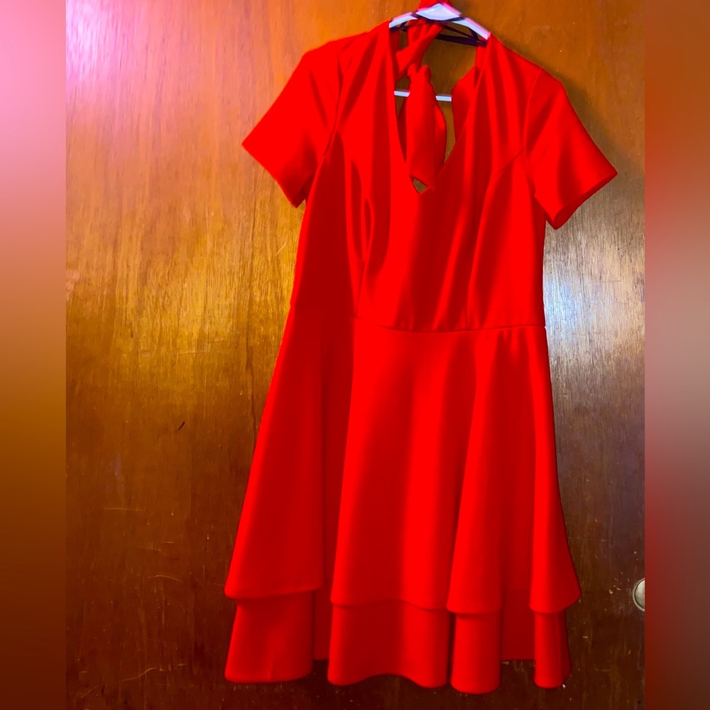 Red, modest, v-neck, short sleeved dress. With neck tie detailing.